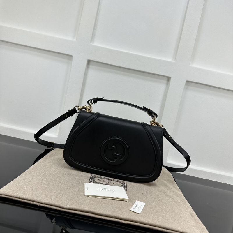 G*u*i top handle bags